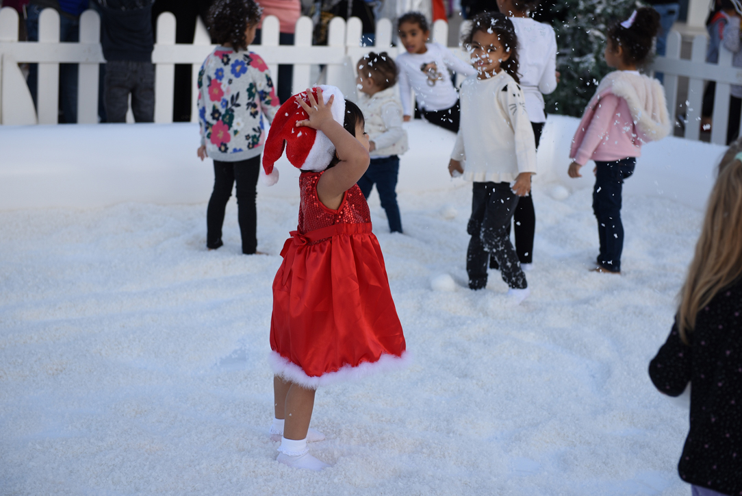 Kids enjoying in the snow_Winter Village