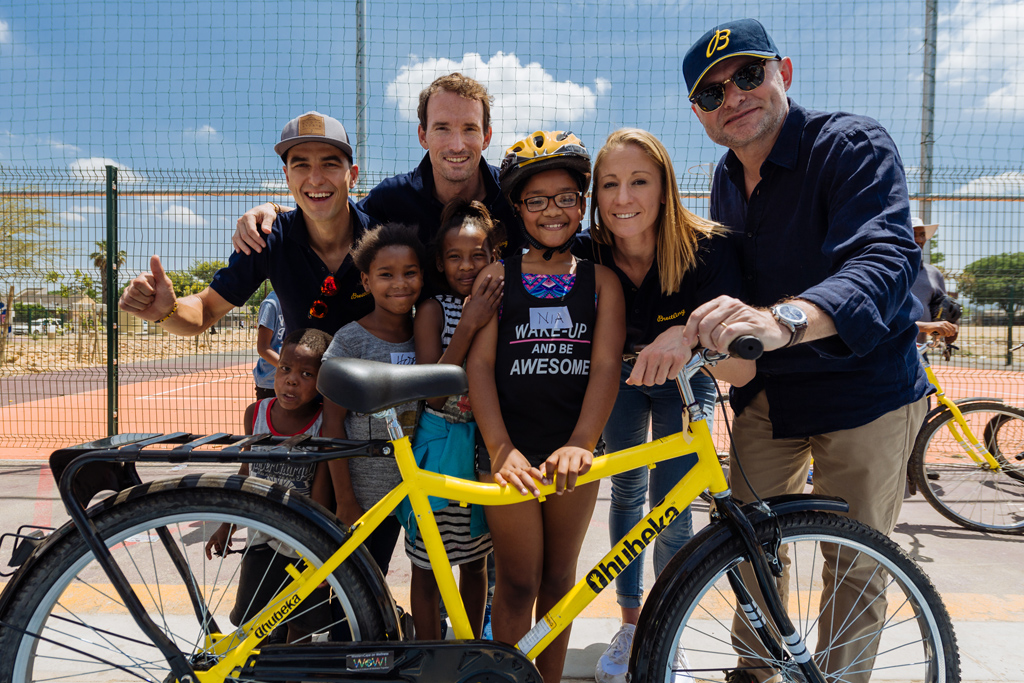 November 25th 2018, the Breitling Triathlon Squad visited one of Qhubeka’s projects and were able to experience firsthand the impact of the charity’s work (left to right: Swiss mountain biker Nino Schurter, Breitling ambassador Ronnie Schildknecht, Breitling Triathlon Squad member Daniela Ryf and Breitling CEO Georges Kern). (PPR/Breitling)