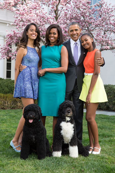 President Barack Obama, First Lady Michelle Obama, and daughters Malia and Sasha pose for a family portrait with Bo and Sunny in the Rose Garden of the White House on Easter Sunday, April 5, 2015. (Official White House Photo by Pete Souza)