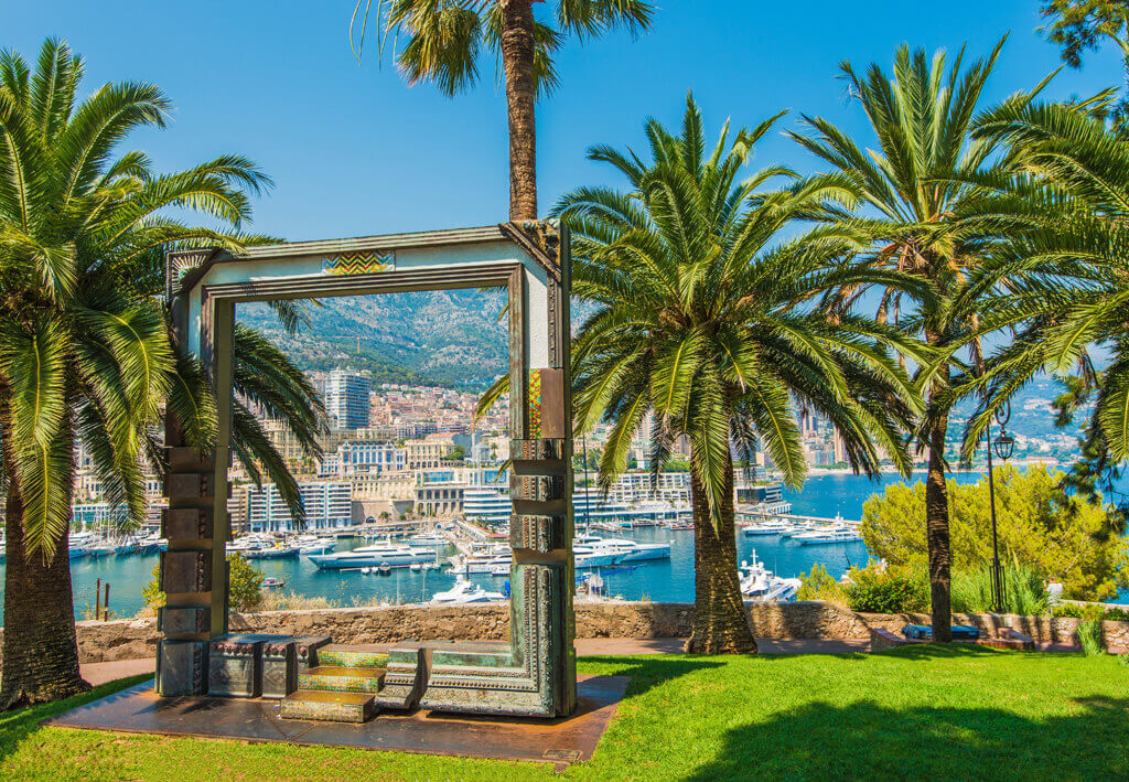 Monte Carlo Monaco Scenic View Through Art Frame Sculpture in the Monte Carlo Park. Monaco Marina and the Cityscape.